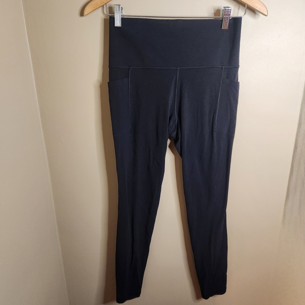 Athleta Salutation Stash Tight Black Size Small 599749